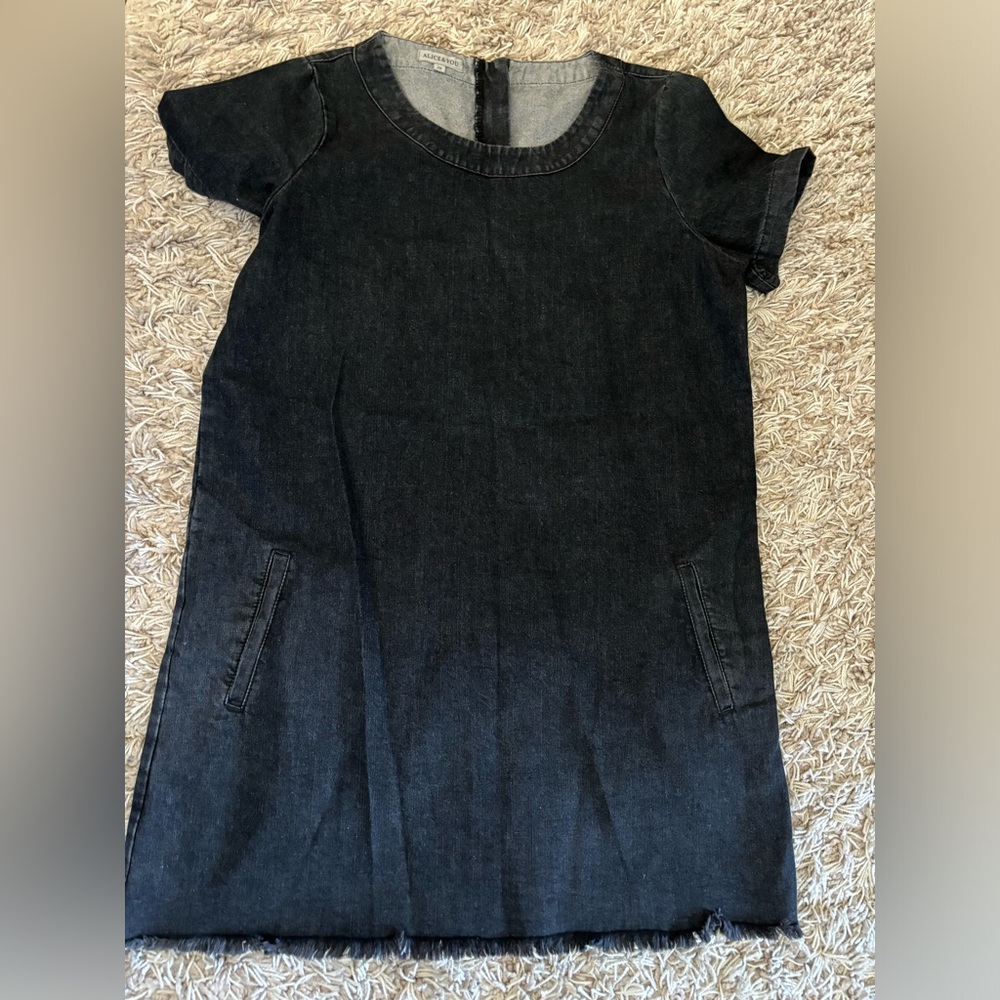 Really cute dark denim dress. Pockets. Zip up the back. Frayed hem